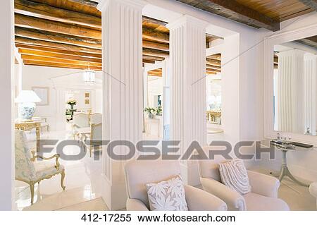Stock Photography - Luxury living room with pillars. Fotosearch