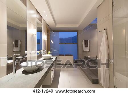 Stock Photo - Modern bathroom at night. Fotosearch