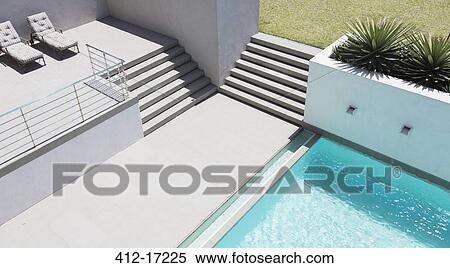Stock Photography - Modern patio with swimming pool. Fotosearch