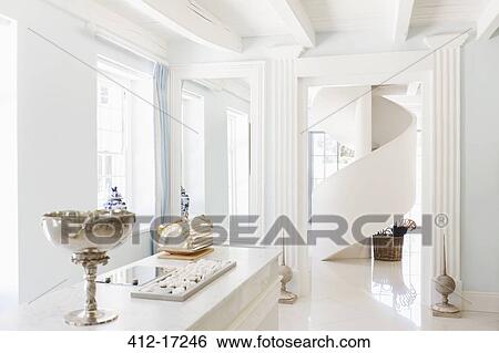 Stock Photograph - Spiral staircase in luxury home. Fotosearch