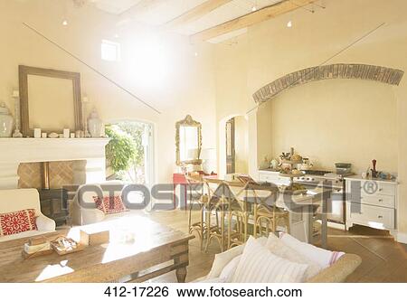 Sun shining through living room windows View Large Photo Image Stock Photograph - Sun shining through living room windows. Fotosearch