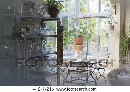 Table in sunroom View Large Photo Image Stock Photography - Table in sunroom. Fotosearch