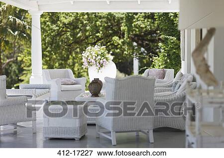 White wicker furniture on luxury patio View Large Photo Image Stock Photo - White wicker furniture on luxury patio. Fotosearch