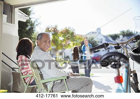 Family in garage View Large Photo Image Stock Image - Family in garage. Fotosearch
