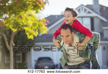 Father piggybacking son View Large Photo Image Stock Image - Father piggybacking son. Fotosearch