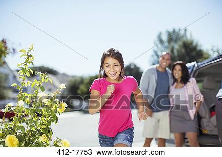Stock Image - Girl running outdoors. Fotosearch