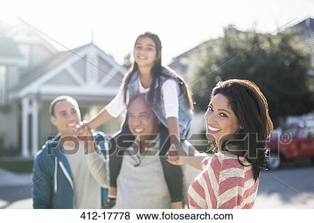 Portrait of happy multi-generation family outdoors View Large Photo Image Stock Photo - Portrait of happy multi-generation family outdoors. Fotosearch