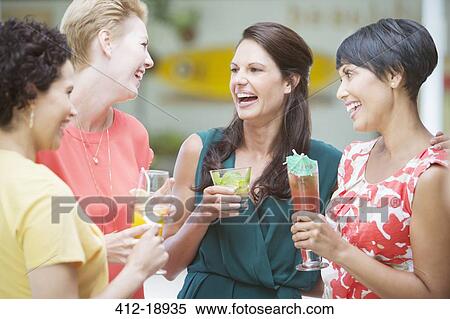 Women talking at party View Large Photo Image Stock Photography - Women talking at party. Fotosearch