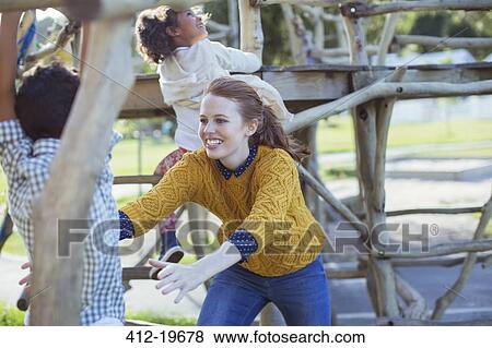 Student and teacher playing outdoors View Large Photo Image Stock Photo - Student and teacher playing outdoors. Fotosearch
