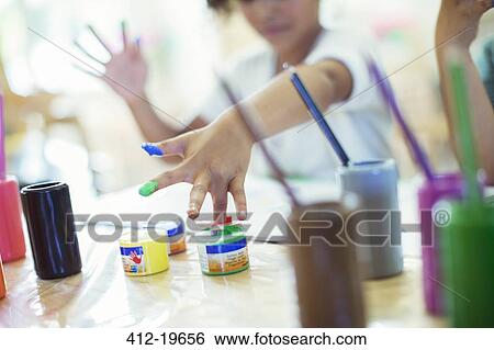 Student finger painting in class View Large Photo Image Stock Photograph - Student finger painting in class. Fotosearch