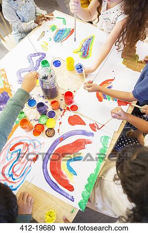 Students painting in classroom View Large Photo Image Stock Image - Students painting in classroom. Fotosearch