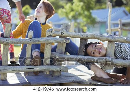 Teacher and students playing on play structure View Large Photo Image Stock Photography - Teacher and students playing on play structure. Fotosearch
