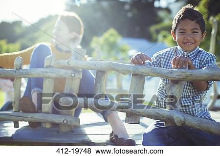 Teachers and students playing on play structure View Large Photo Image Stock Photo - Teachers and students playing on play structure. Fotosearch