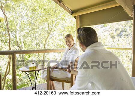 Couple relaxing together in spa View Large Photo Image Stock Image - Couple relaxing together in spa. Fotosearch