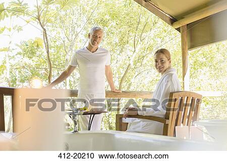 Stock Image - Couple relaxing together in spa. Fotosearch