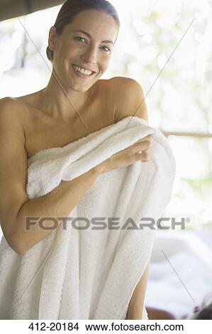 Picture - Woman toweling off in spa. Fotosearch