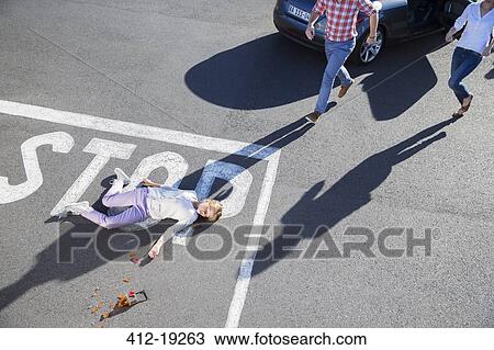 Driver rushing to injured girl on street View Large Photo Image Stock Image - Driver rushing to injured girl on street. Fotosearch