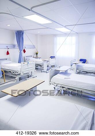 Empty beds in hospital room View Large Photo Image Stock Photograph - Empty beds in hospital room. Fotosearch
