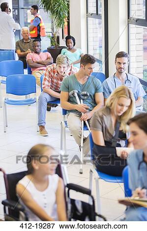 Stock Photo - Patients in hospital waiting room. Fotosearch