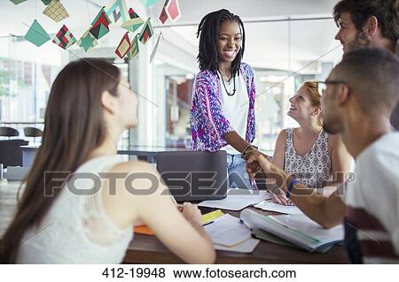 People shaking hands in meeting View Large Photo Image Stock Photo - People shaking hands in meeting. Fotosearch