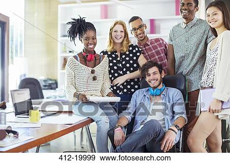 Stock Photo - People smiling in office. Fotosearch
