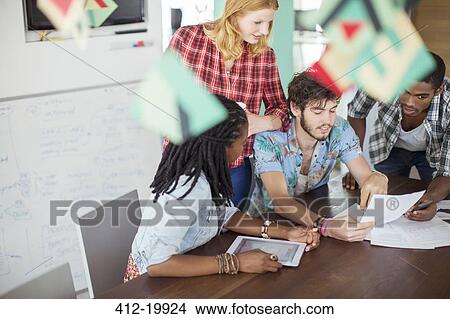 Picture - People talking in meeting. Fotosearch
