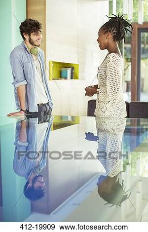 People talking in office View Large Photo Image Stock Photo - People talking in office. Fotosearch