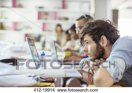 Picture - People working in office. Fotosearch