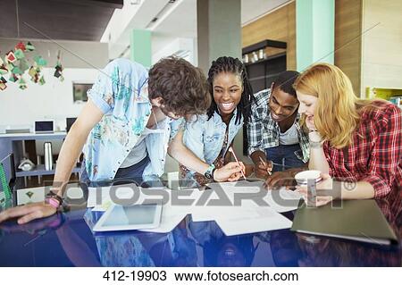 People working together in cafe View Large Photo Image Stock Image - People working together in cafe. Fotosearch