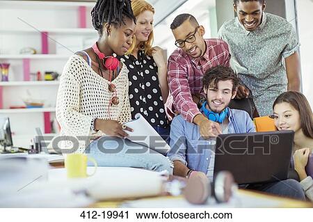 People working together in office View Large Photo Image Stock Image - People working together in office. Fotosearch