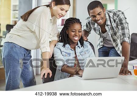 People working together in office View Large Photo Image Stock Photo - People working together in office. Fotosearch