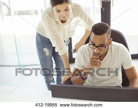 People working together in office View Large Photo Image Stock Photography - People working together in office. Fotosearch