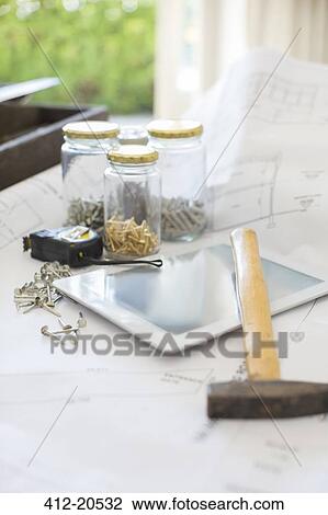 Digital tablet surrounded by building materials View Large Photo Image Stock Image - Digital tablet surrounded by building materials. Fotosearch