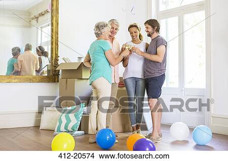 Family celebrating with drinks View Large Photo Image Picture - Family celebrating with drinks. Fotosearch