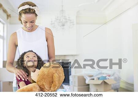 Mother and daughter looking at each other View Large Photo Image Stock Image - Mother and daughter looking at each other . Fotosearch