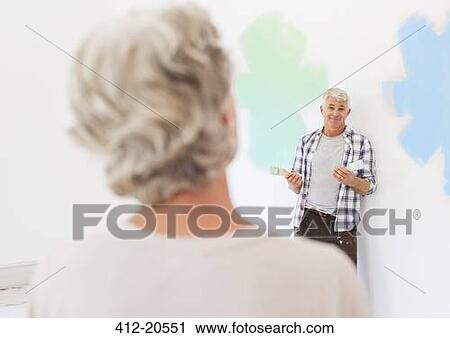 Older couple deciding on paint colors together View Large Photo Image Stock Image - Older couple deciding on paint colors together . Fotosearch