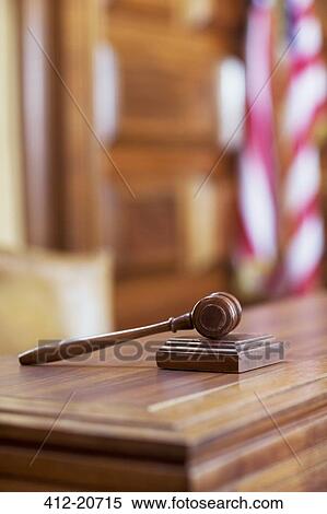 Gavel laying on judge's bench in court View Large Photo Image Stock Photography - Gavel laying on judge's bench in court. Fotosearch