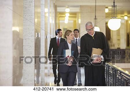 Judge and lawyer talking in courthouse View Large Photo Image Stock Image - Judge and lawyer talking in courthouse. Fotosearch