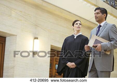 Judge and lawyer talking in courthouse View Large Photo Image Stock Photography - Judge and lawyer talking in courthouse. Fotosearch