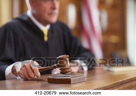 Judge banging gavel in court View Large Photo Image Stock Photo - Judge banging gavel in court . Fotosearch