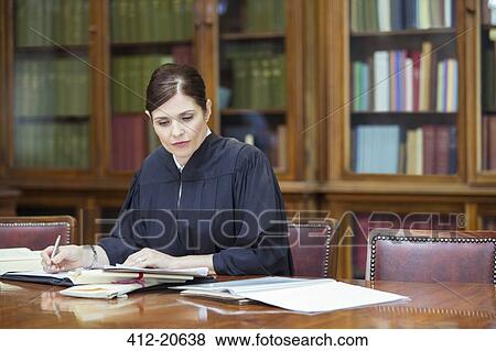 Judge doing research in chambers View Large Photo Image Stock Photo - Judge doing research in chambers. Fotosearch