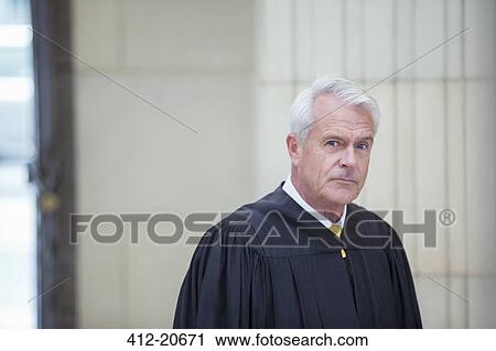 Judge standing in courthouse View Large Photo Image Stock Image - Judge standing in courthouse . Fotosearch