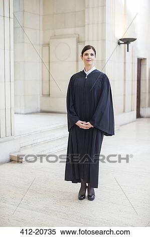 Judge standing in courthouse View Large Photo Image Stock Photography - Judge standing in courthouse. Fotosearch