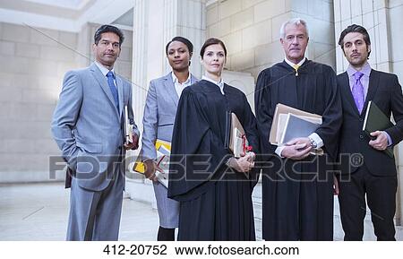 Judges and lawyers standing together in courthouse View Large Photo Image Stock Image - Judges and lawyers standing together in courthouse. Fotosearch