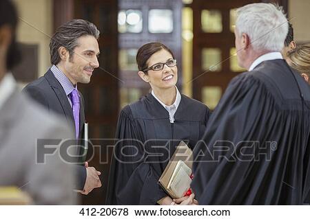 Judges and lawyers talking outside courtroom View Large Photo Image Stock Photo - Judges and lawyers talking outside courtroom. Fotosearch