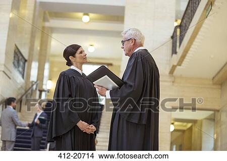 Judges talking in courthouse View Large Photo Image Picture - Judges talking in courthouse. Fotosearch