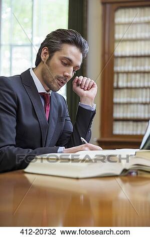 Lawyer doing research in chambers View Large Photo Image Stock Image - Lawyer doing research in chambers. Fotosearch