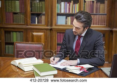 Lawyer doing research in chambers View Large Photo Image Stock Photo - Lawyer doing research in chambers. Fotosearch