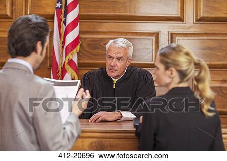 Lawyers pleading case to judge in court View Large Photo Image Stock Photograph - Lawyers pleading case to judge in court. Fotosearch