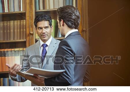 Lawyers talking in chambers View Large Photo Image Stock Image - Lawyers talking in chambers. Fotosearch